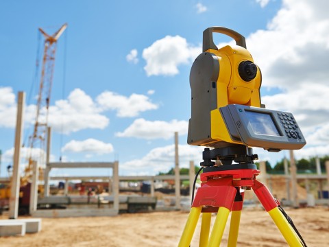 Surveyor equipment theodolite outdoors at construction site